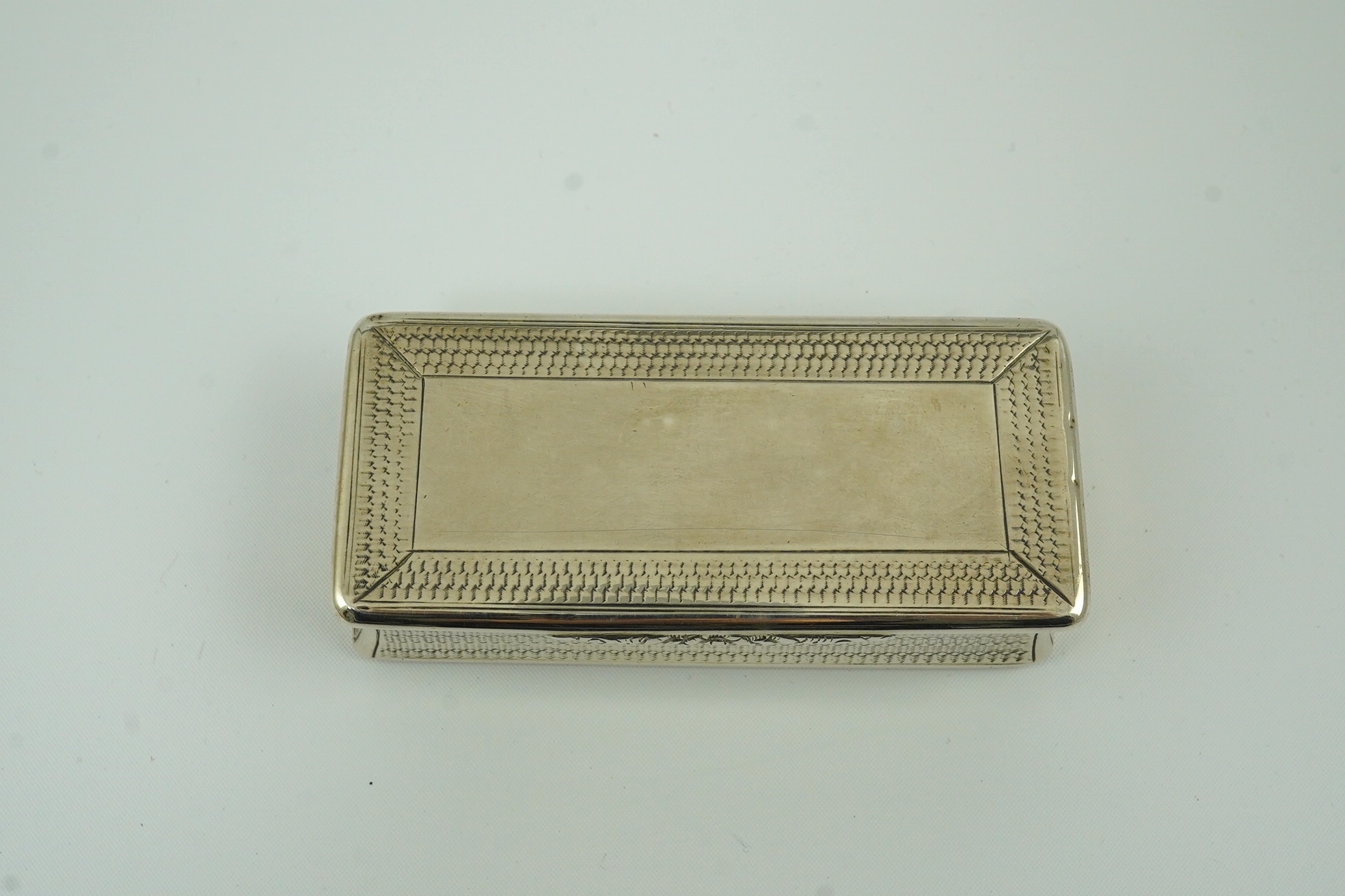 A late William IV engine turned silver rectangular snuff box, by Francis Clark